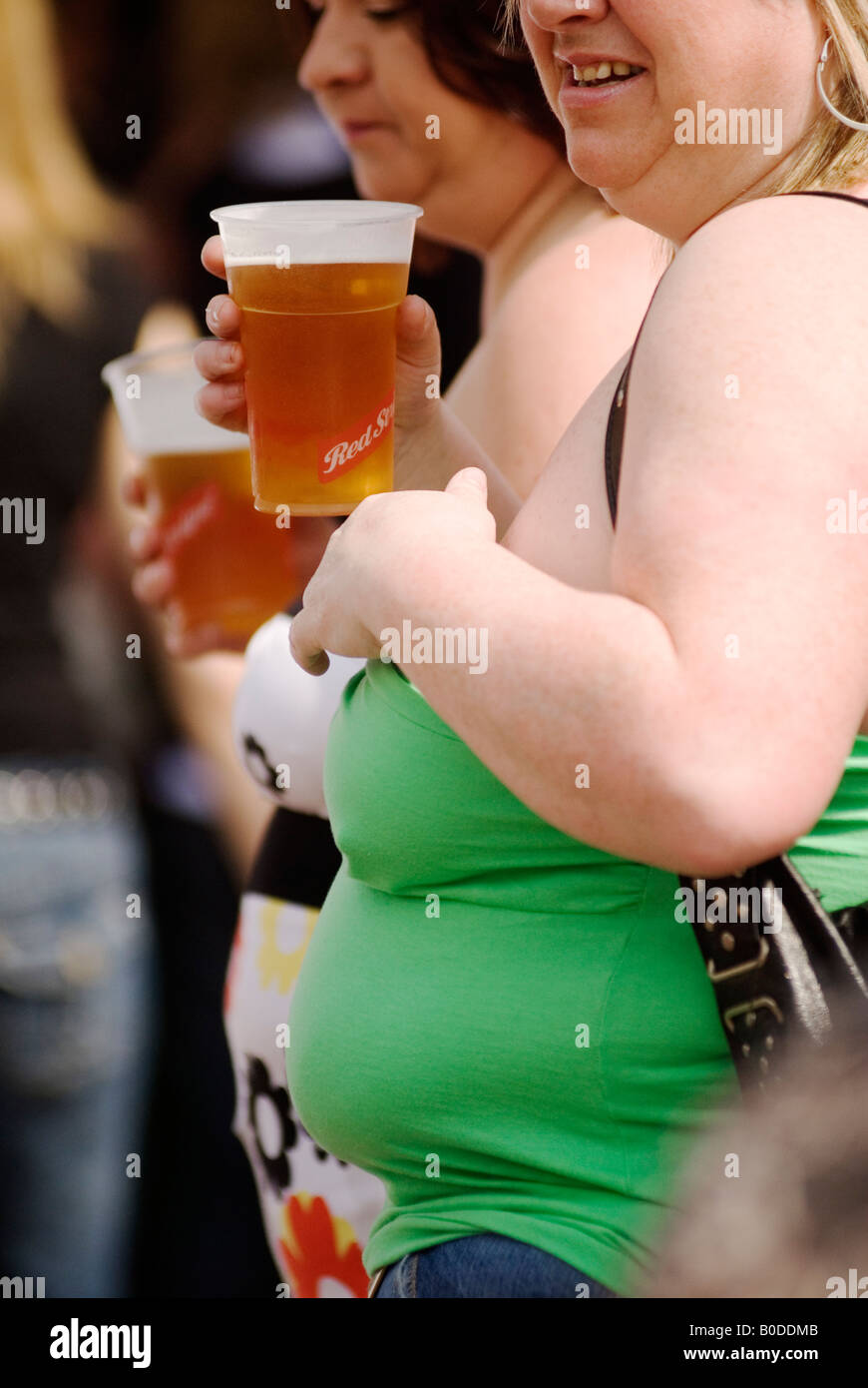 UK drinking alcohol. Obese mature two fat women drinks pint of beer  Cambridge England 2005 2000s HOMER SYKES Stock Photo - Alamy