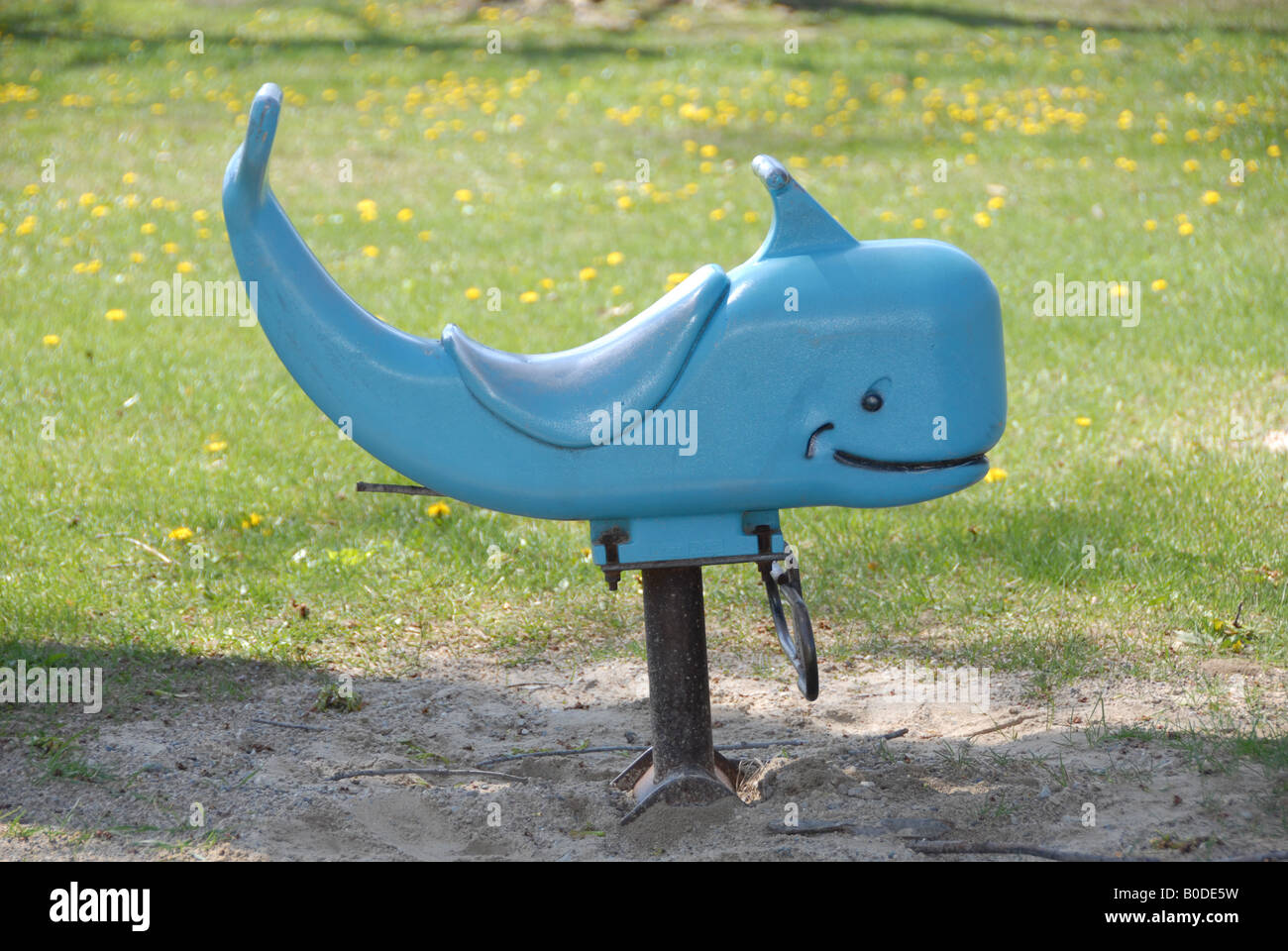 An old stationary whale ride at a children's park. Stock Photo