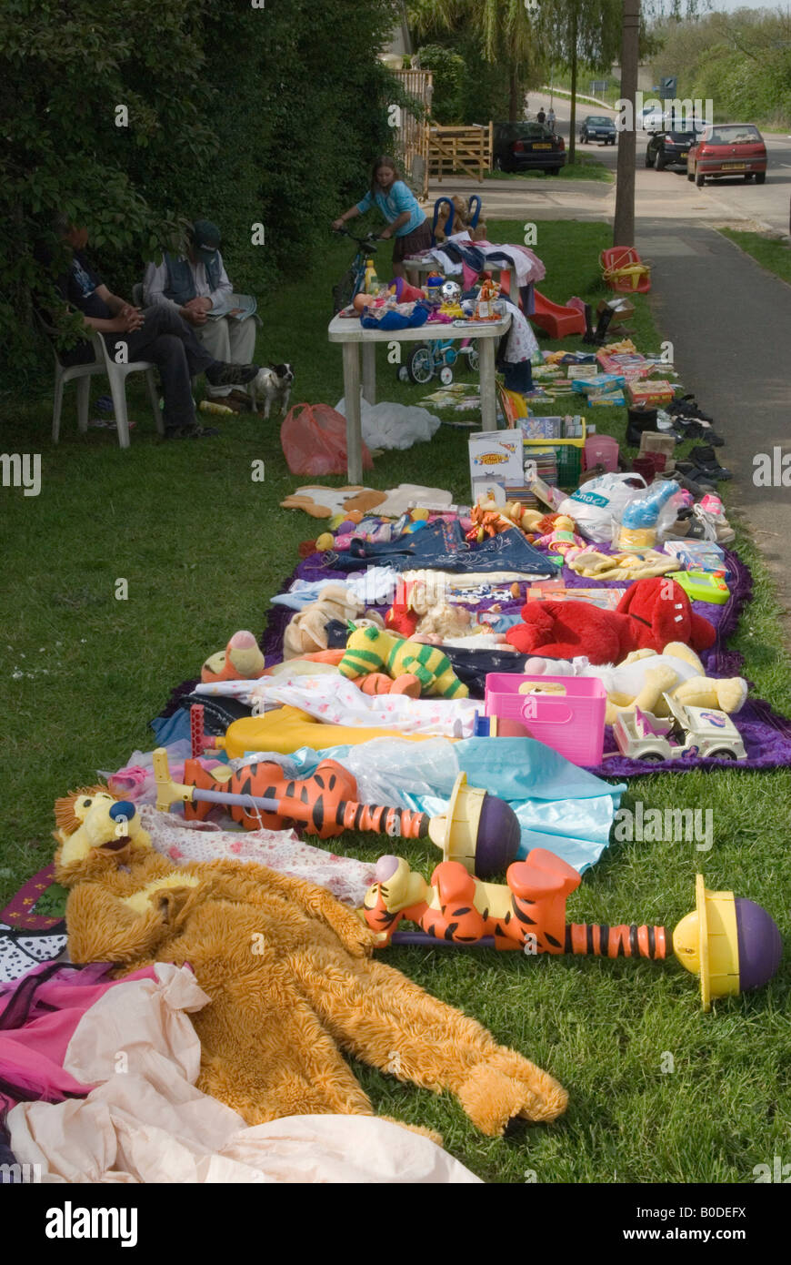 Consumer society, unwanted toys young girl has grown up, for sale at