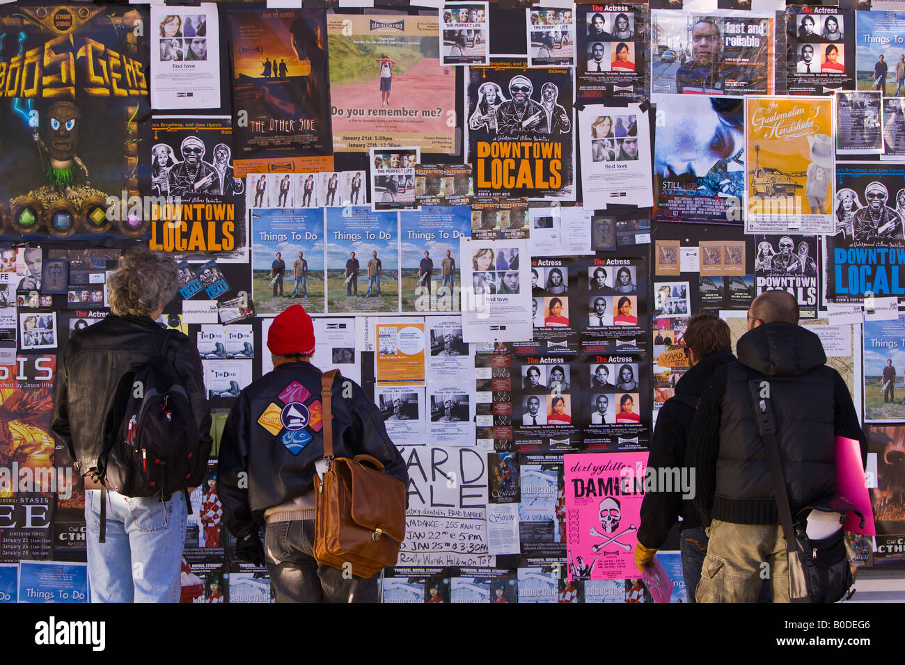 PARK CITY UTAH USA People look at posters on Main Street during the Sundance Film Festival Stock Photo