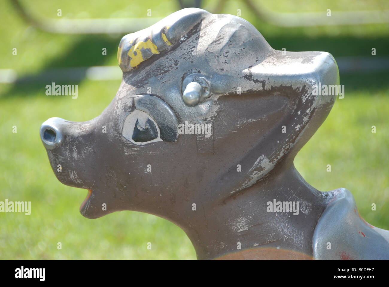 An old stationary deer ride at a children's park. Stock Photo