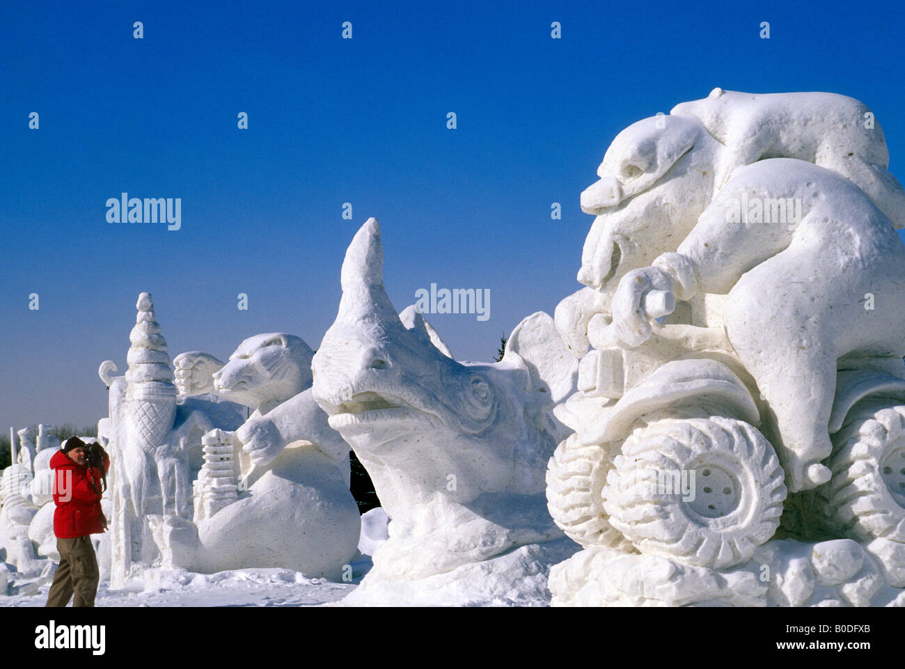 PHOTOGRAPHING SNOW SCULPTURES DURING ST. PAUL, MINNESOTA'S ANNUAL WINTER CARNIVAL. Stock Photo