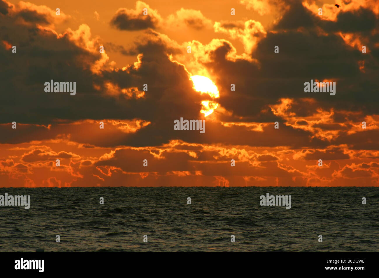 Gulf Coast sunset playing peak a boo with ciouds Tampa Bay Florida Stock Photo