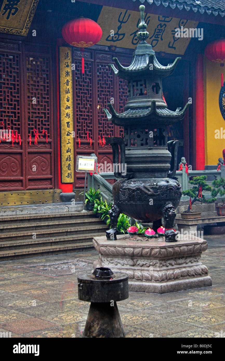 Worshipper At A Buddhist Temple China Stock Photo