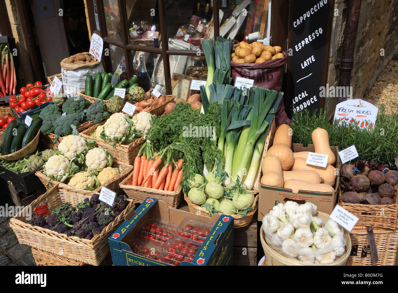 Boxes of colourful vegetables outside a greengrocers shop in the ...