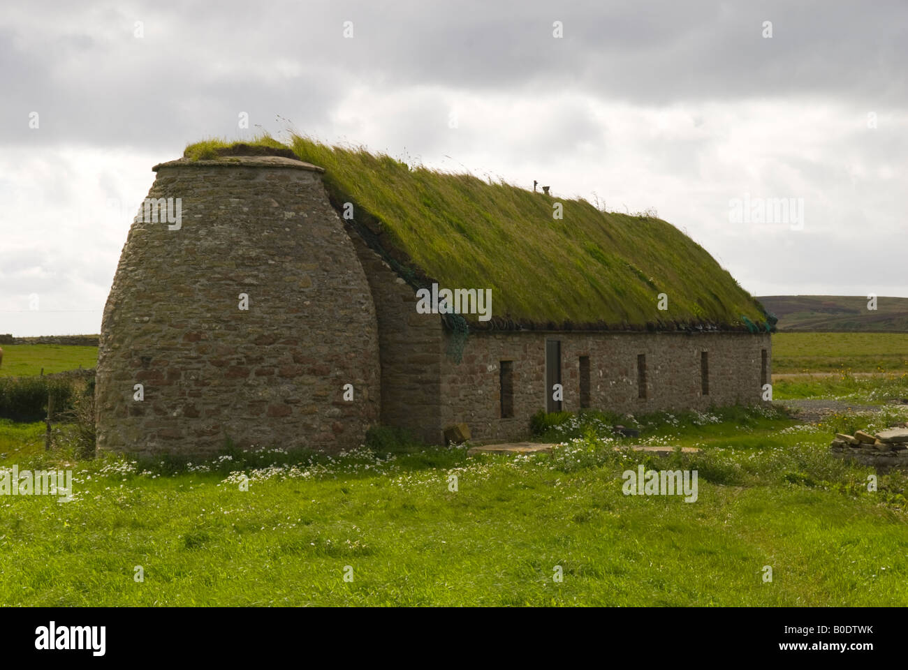 Restored turf roofed farm building at Hoxa, South Ronaldsay, Orkney Islands, Scotland, UK Stock Photo