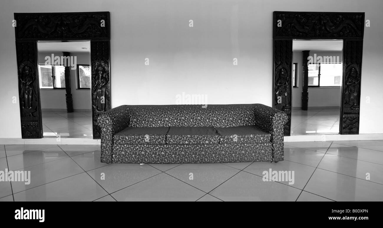 sofa and mirrors in hall of hotel Stock Photo