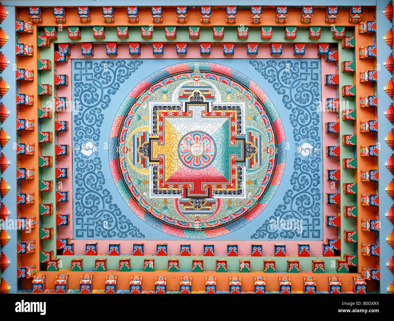 Tibetan mandala painting on monestery ceiling Upper Pisang Nepal Stock Photo