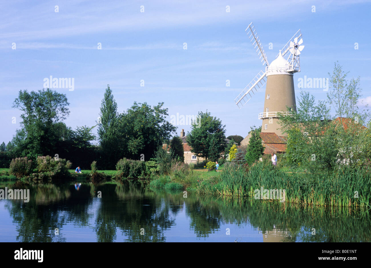 Denver Windmill Mill Norfolk tower mill white cap sails lake reflection East Anglia England UK windmills mills English Stock Photo