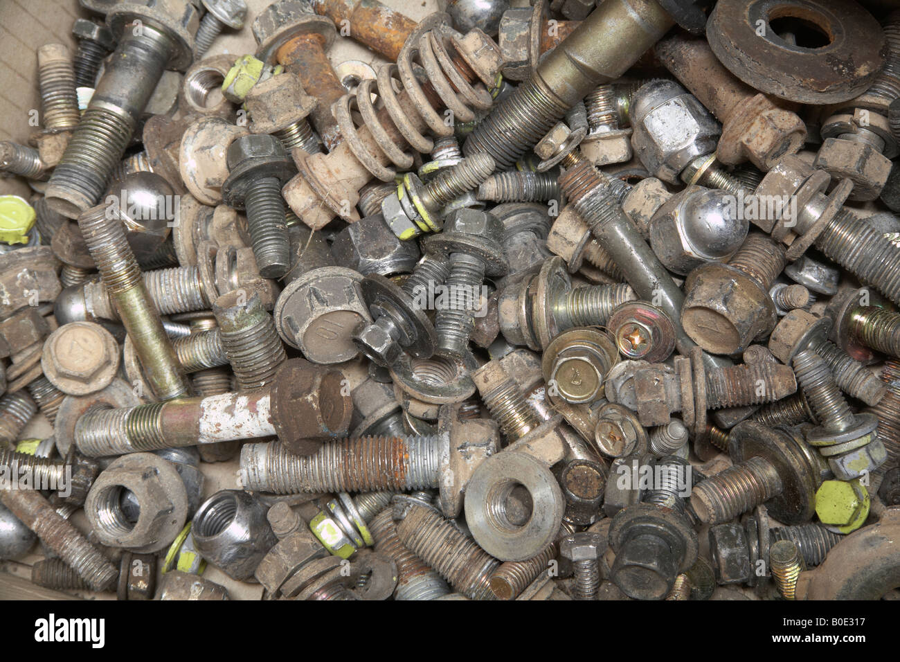 left over nuts, bolts and washers in an automotive Stock Photo