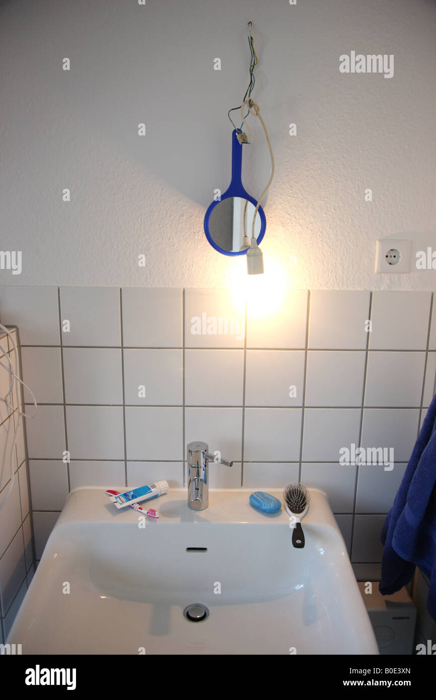 Bathroom temporary mirror and light Stock Photo - Alamy