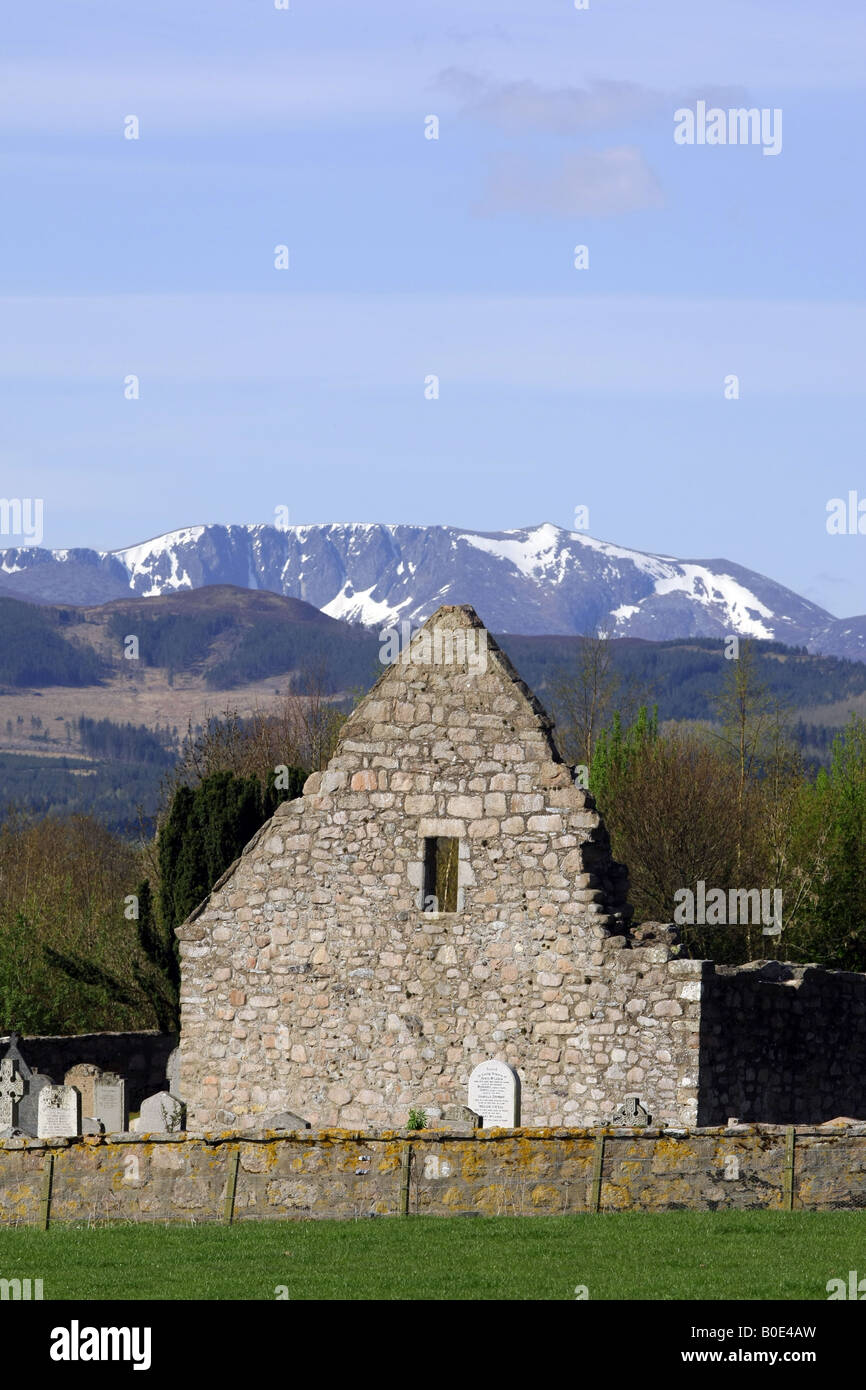 The ruin of Tullich kirk near Ballater, Aberdeenshire, Scotland, with the snow capped mountain of Lochnagar in the background Stock Photo