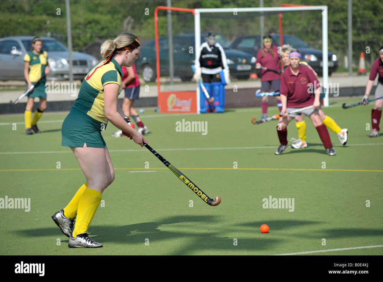 women playing field hockey Stock Photo Alamy