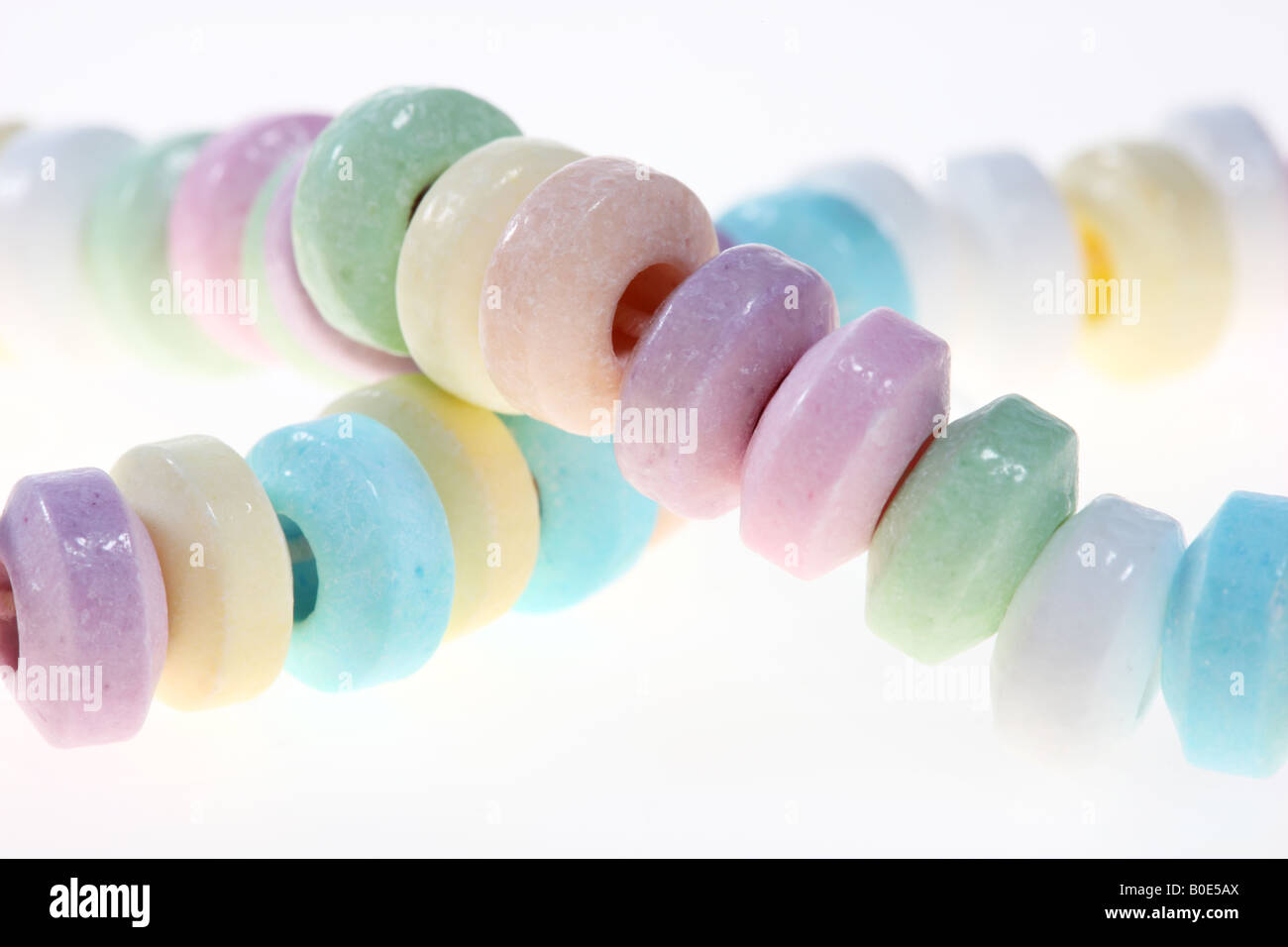 Sweets Chain of colored candys Stock Photo