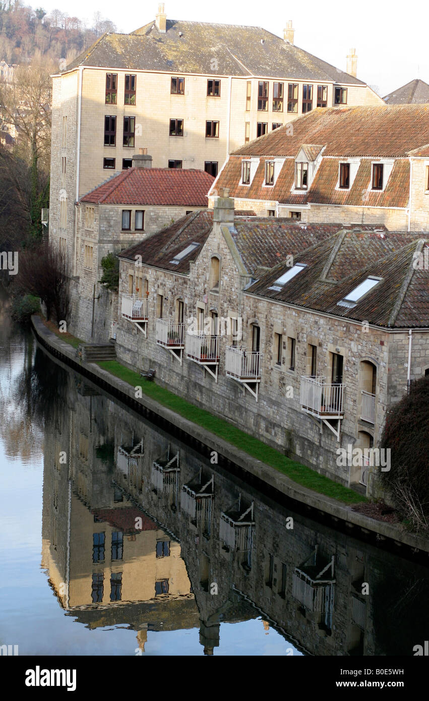 Reflection of riverside stone house in bath uk Stock Photo - Alamy