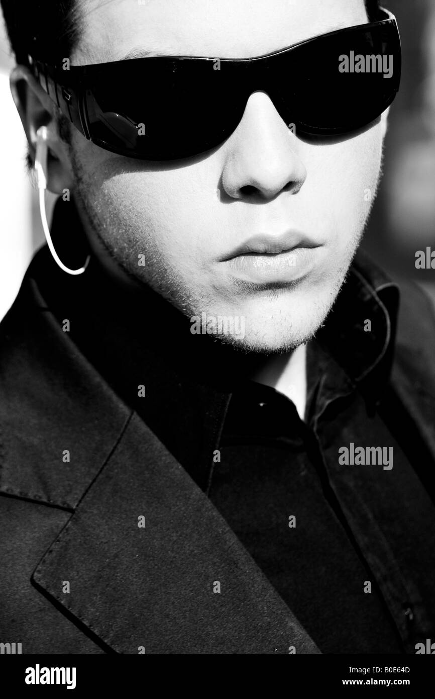 Young model performing security agent Stock Photo