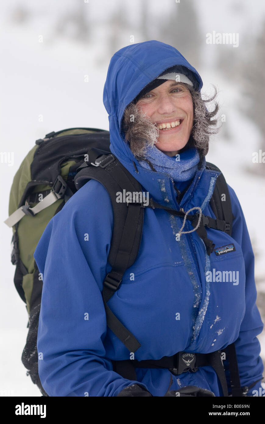 Wimter portrait of a woman skier with frosty in her hair Stock Photo