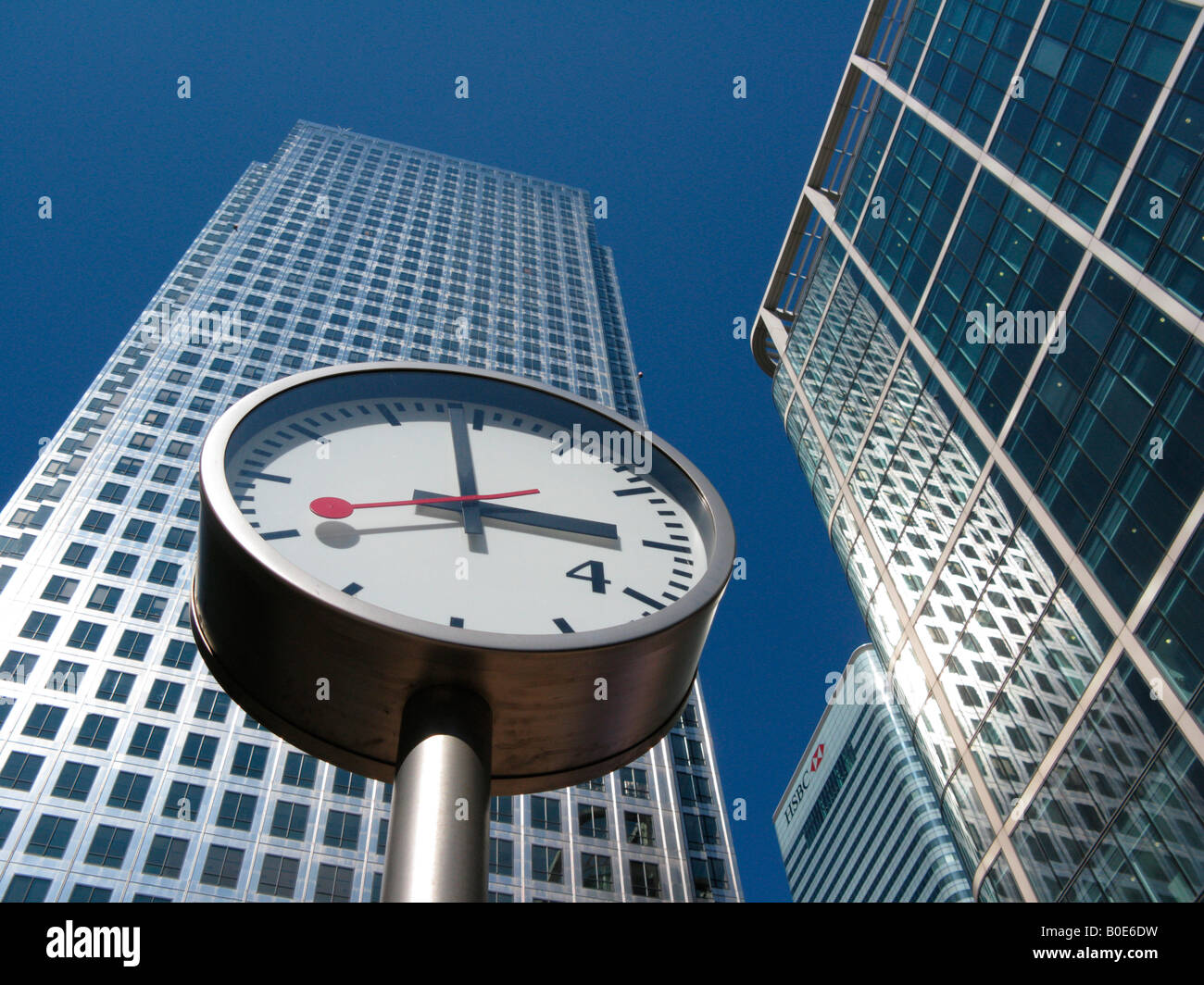 Clock in Reuters Plaza, Canary Wharf London Stock Photo