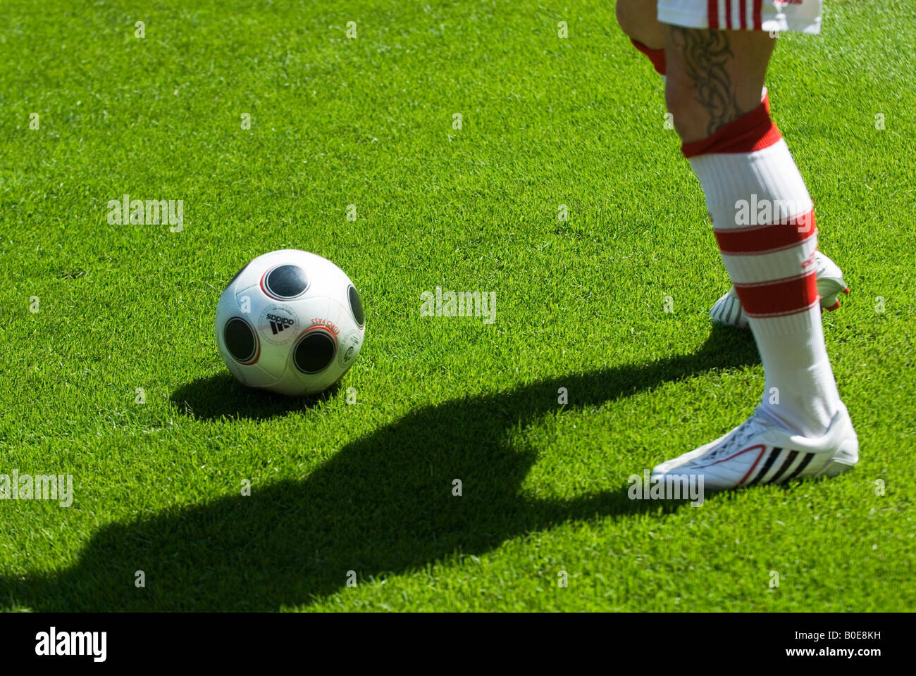 feet and boots of football player and original Europass football Stock  Photo - Alamy