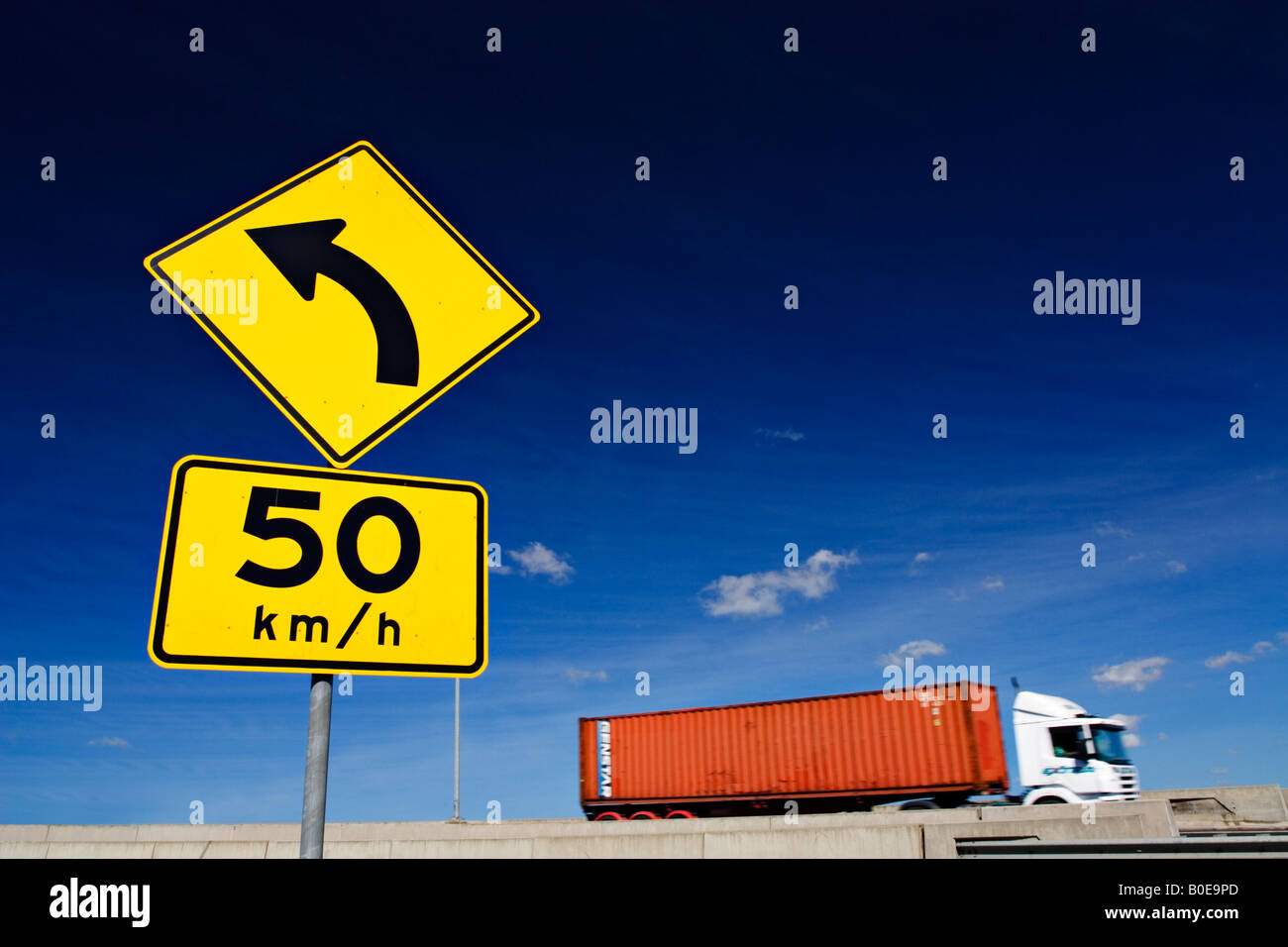 Transportation and  Trucking  / A Container Truck commutes along a section of Freeway.Melbourne Victoria Australia. Stock Photo