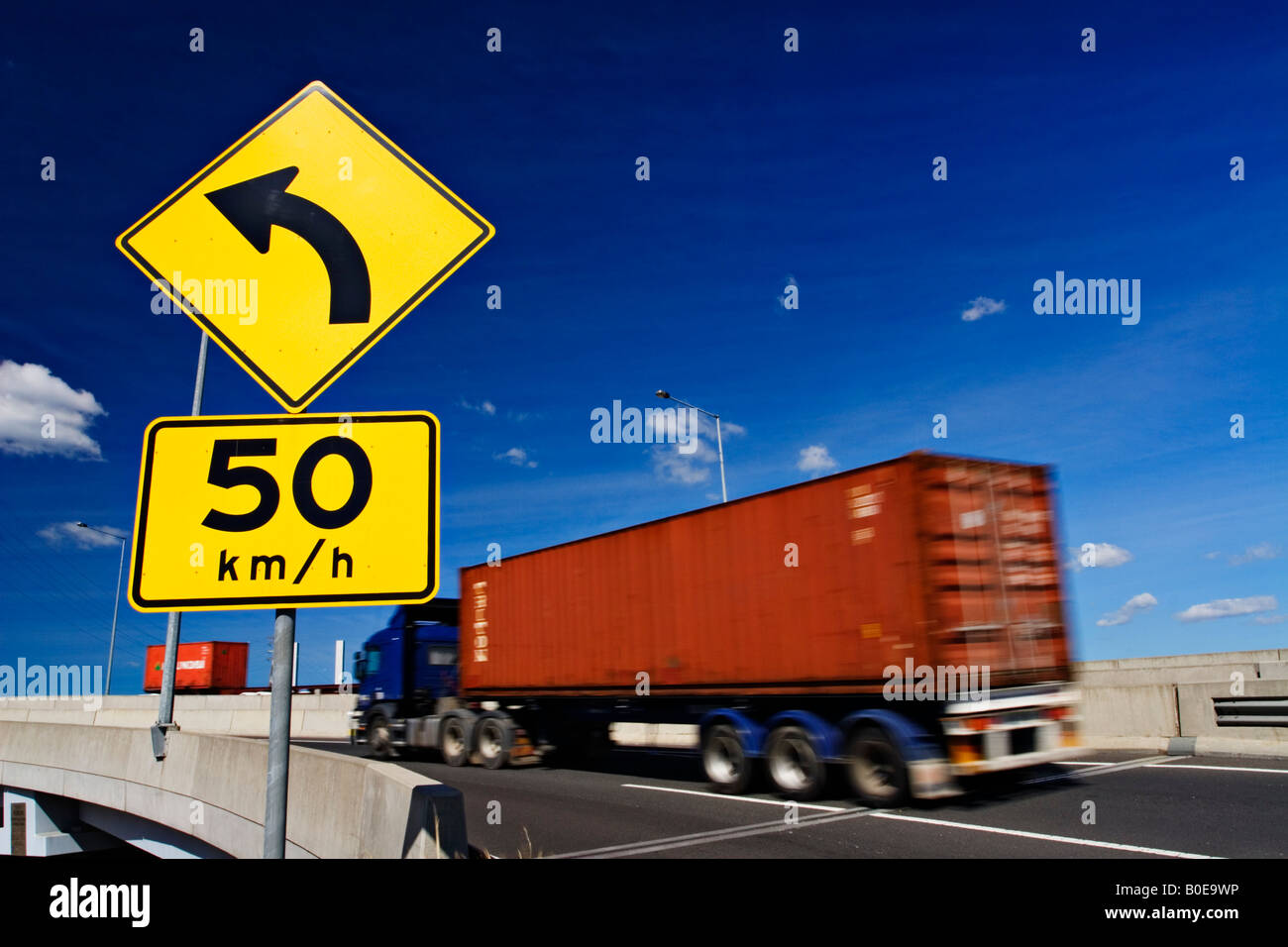 Transportation and  Trucking  / A Container Truck commutes along a section of Freeway.Melbourne Victoria Australia. Stock Photo