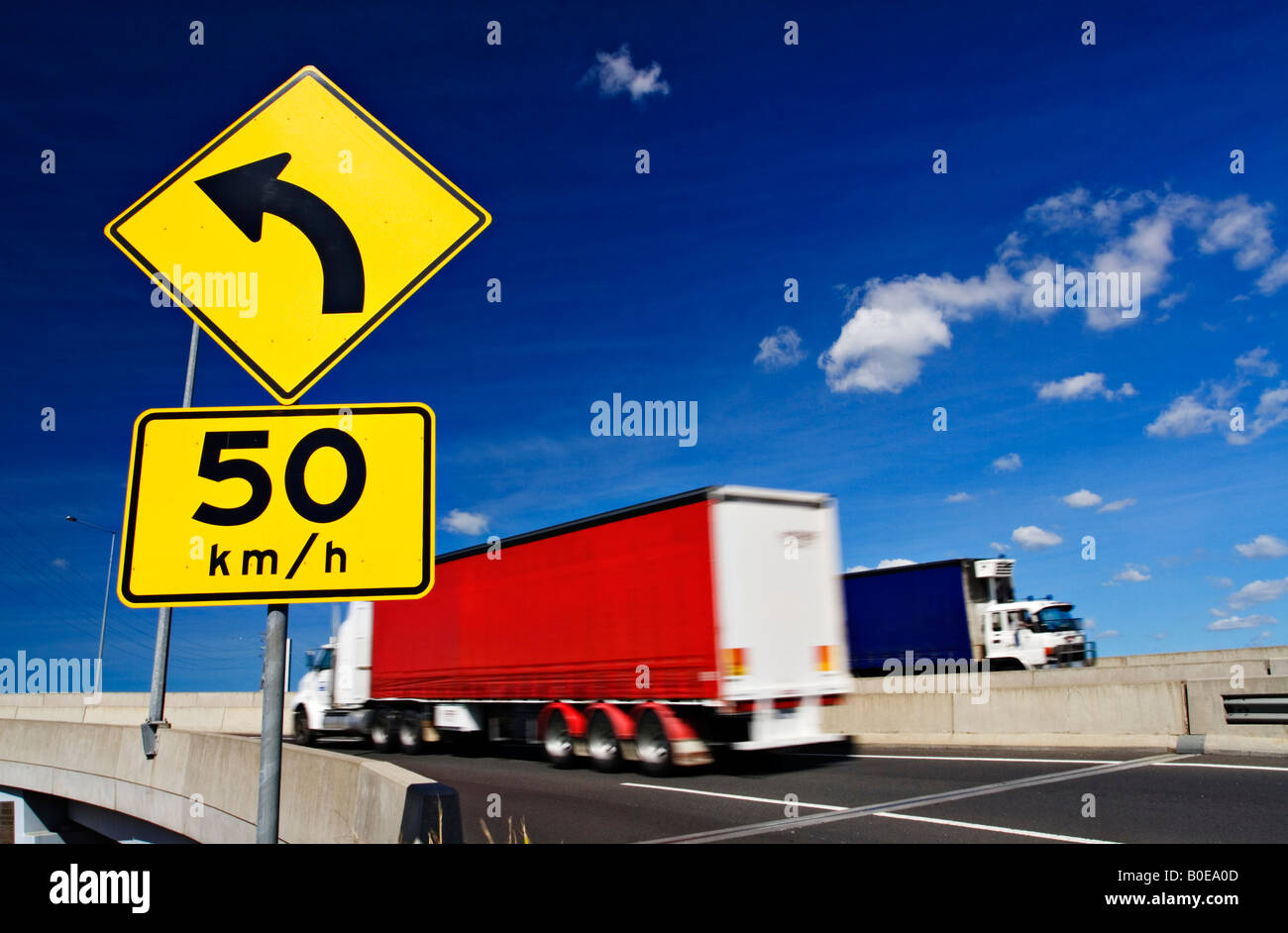 Transportation and Trucking / Transport Trucks commutes along a section of freeway.Melbourne Victoria Australia. Stock Photo