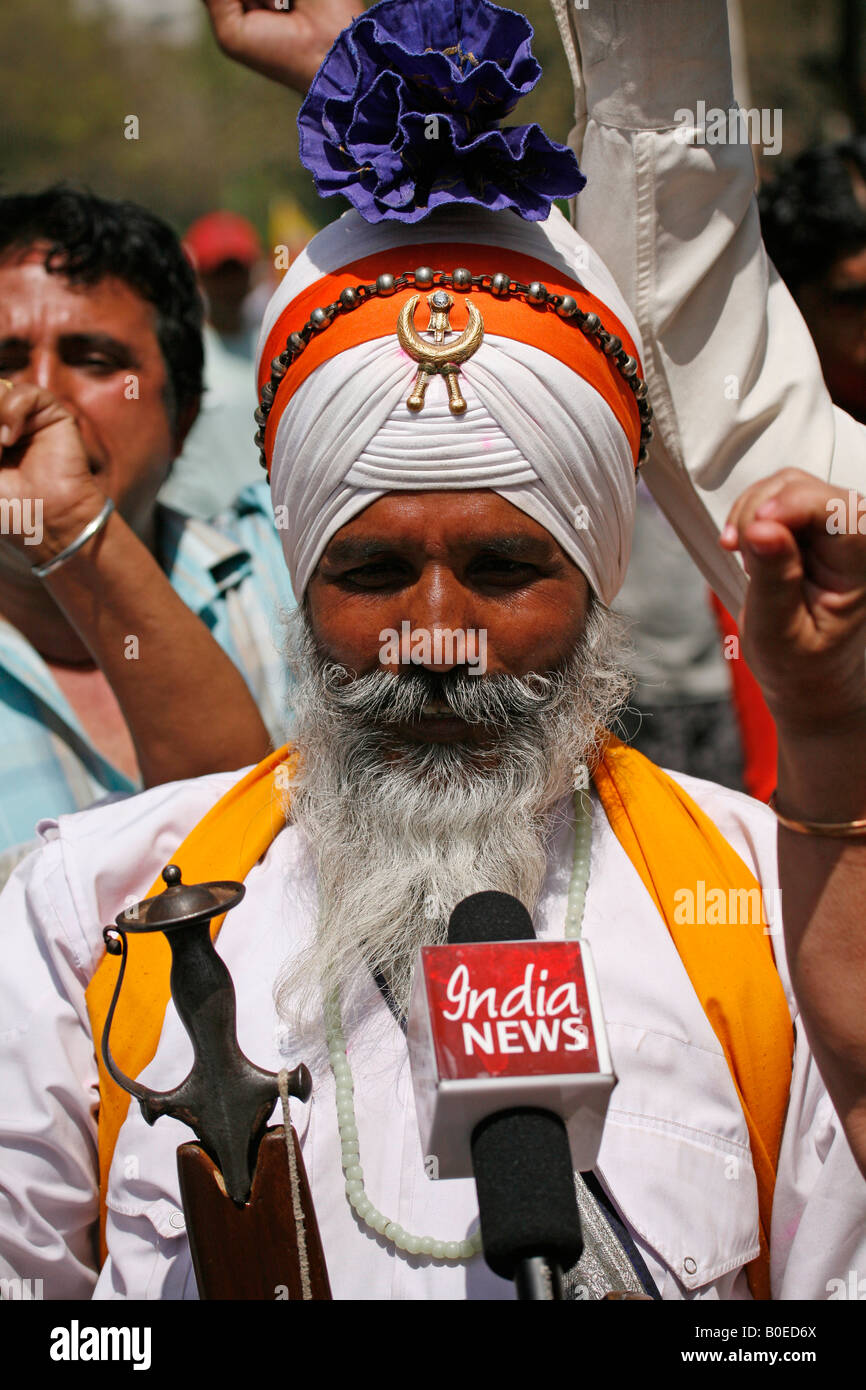 Sikhs from the Rashtriya Sikh Sangh join Tibetan protesters gathered in Janpath, New Delhi, to mark Black Monday. Stock Photo