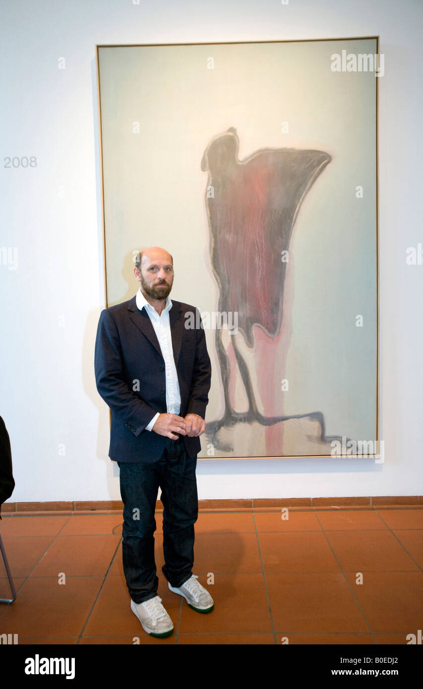 Peter Doig received the Wolfgang Hahn Preis Koeln at the Museum Ludwig he  ist standing infront of his painting Man Dressed atBat Stock Photo - Alamy