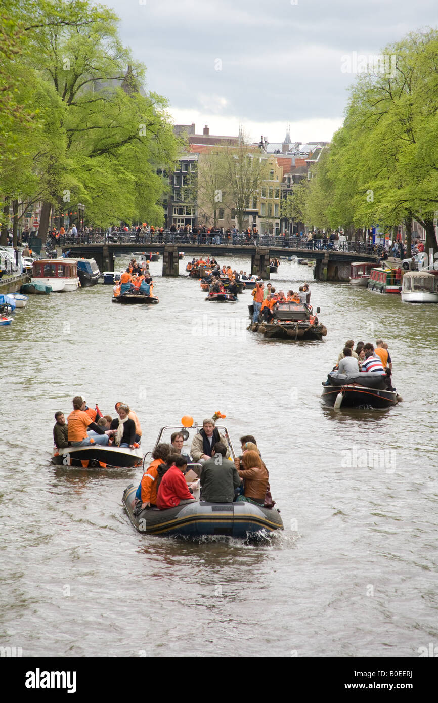 Parties on crowded boats. Queens day 30th April 2008 The annual Dutch national day Amsterdam Holland The Netherlands. Stock Photo