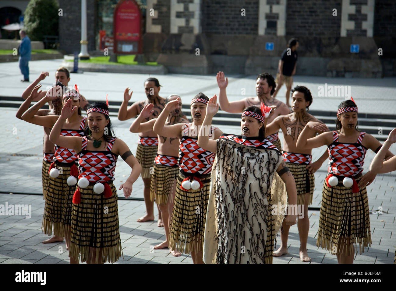 Maori dance group, indigenous Polynesian people, perform song and dance routine in public square in Christchurch,New Zealand,2008 Stock Photo