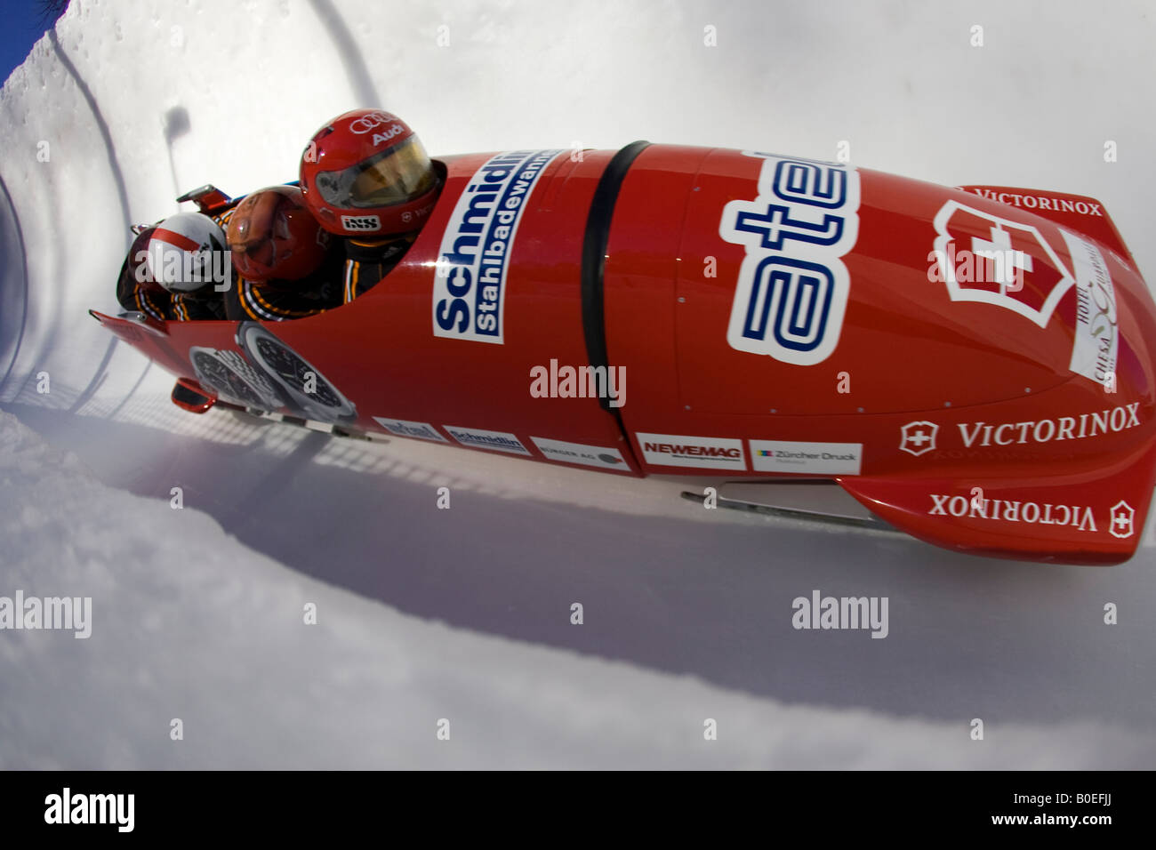 The Swiss Bobsleigh team decend the Olympic run at St Moritz Switzerland Stock Photo