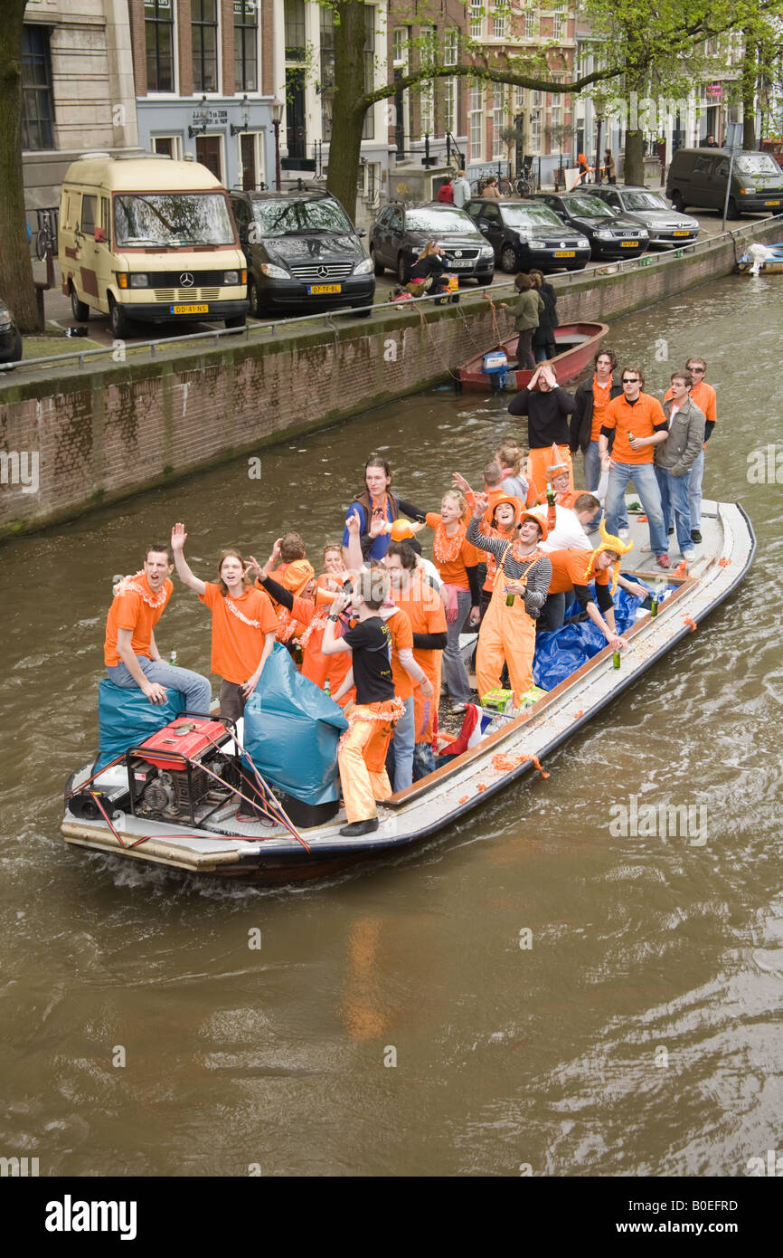 Parties on crowded boats. Queens day 30th April 2008 The annual Dutch national day Amsterdam Holland The Netherlands. Stock Photo