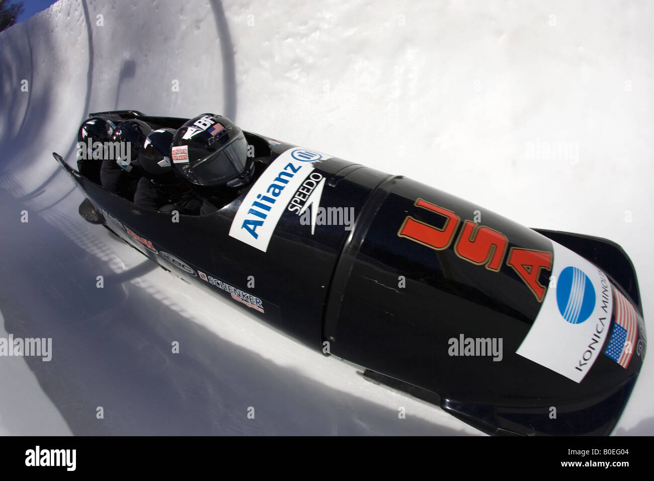 United States 4 man Bobsleigh team running the Olympic course at St Moritz Stock Photo