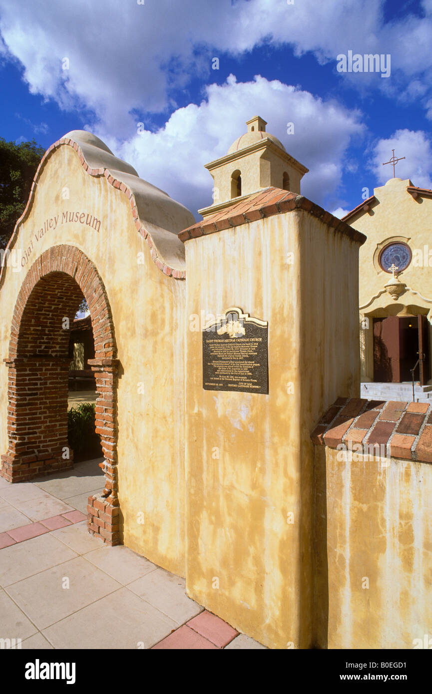 Archway and historic plaque at the entrance to Saint Thomas Aquinas