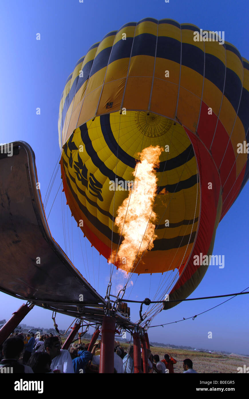 Hot air from a gas heater being pumped into a hot air balloon on West Bank  near Luxor Egypt Stock Photo - Alamy