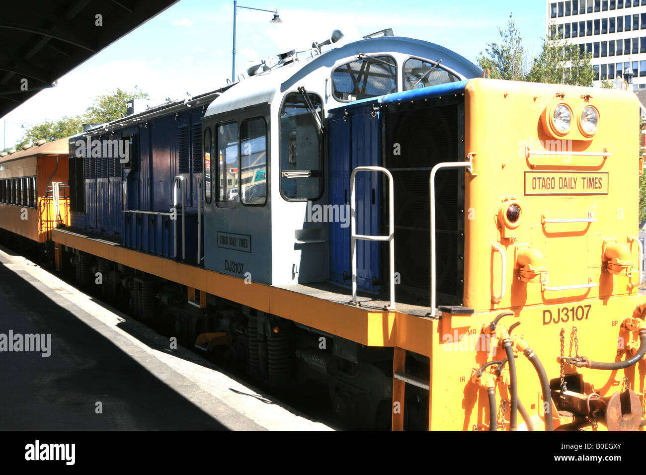A to pull an old train at a platform on Dunedin railway