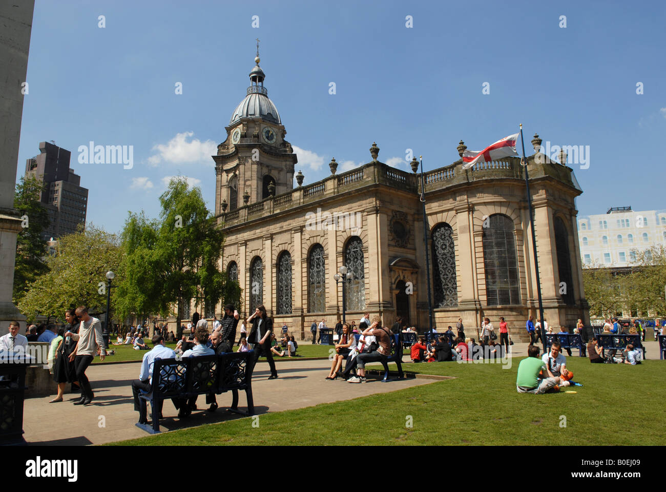 The crowded gardens of St Philip s Cathedral in Birmingham England Stock Photo