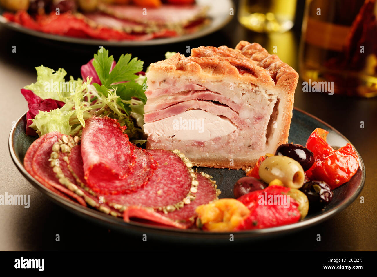 MEAT PIE WITH DELI MEATS AND VEGETABLES Stock Photo