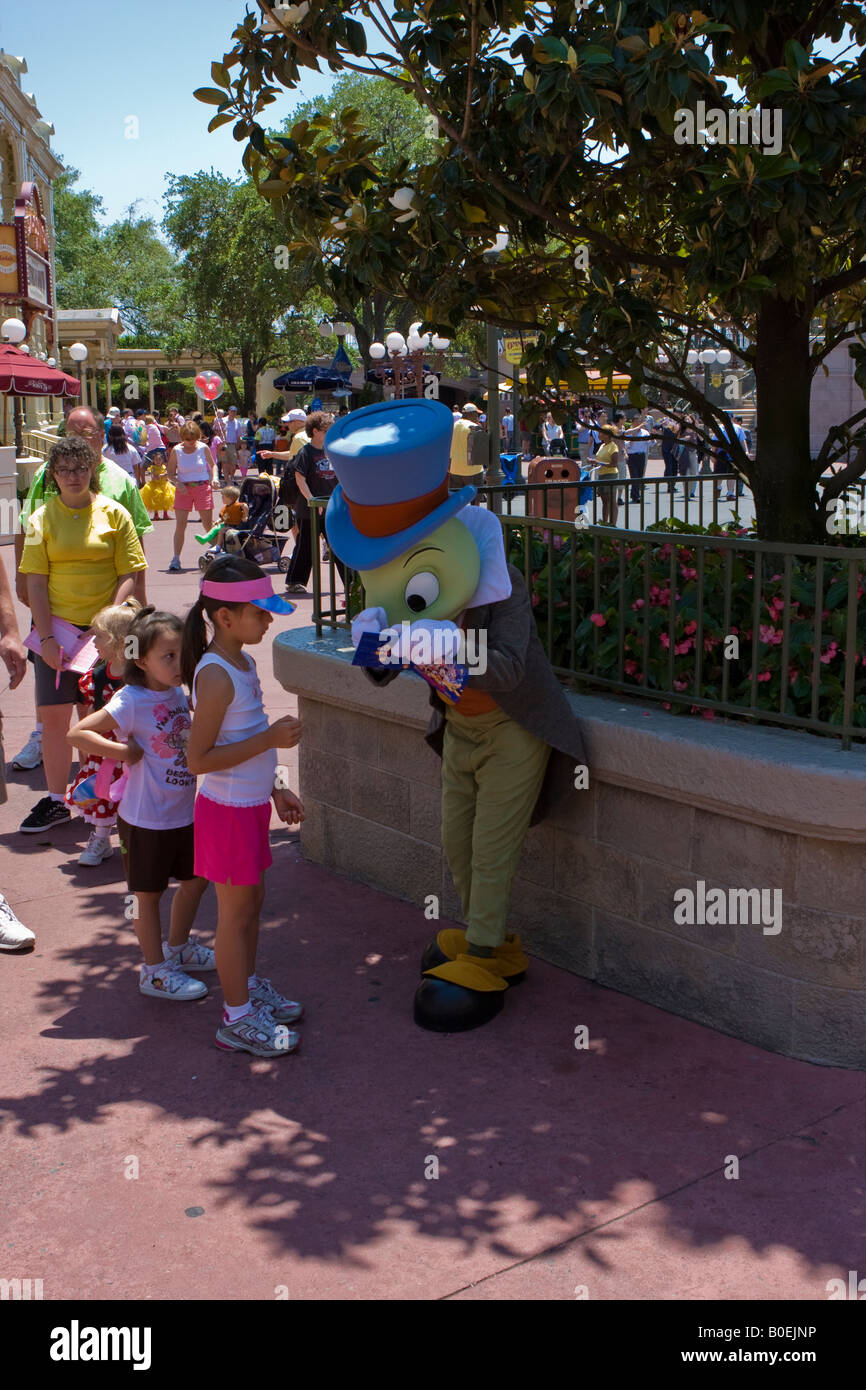 Jiminy Cricket Signing Autographs at Walt Disney World Resort in Orlando Florida Stock Photo
