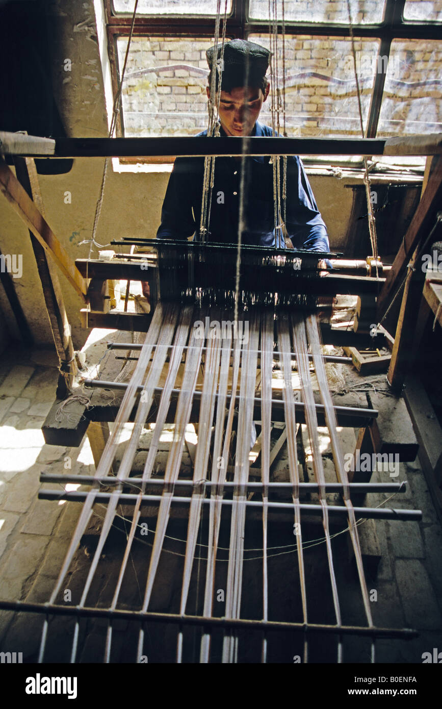 Silk weaving on a traditional loom at Khotan (Hetian) in Xinjiang on