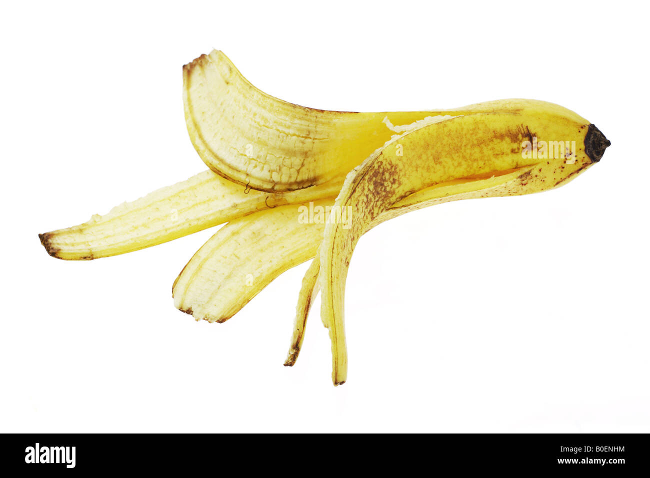 Discarded banana skin on white background Stock Photo