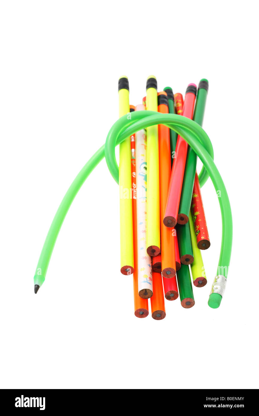 Long flexible pencil securing a bundle of loose unsharpened colorful pencils Stock Photo