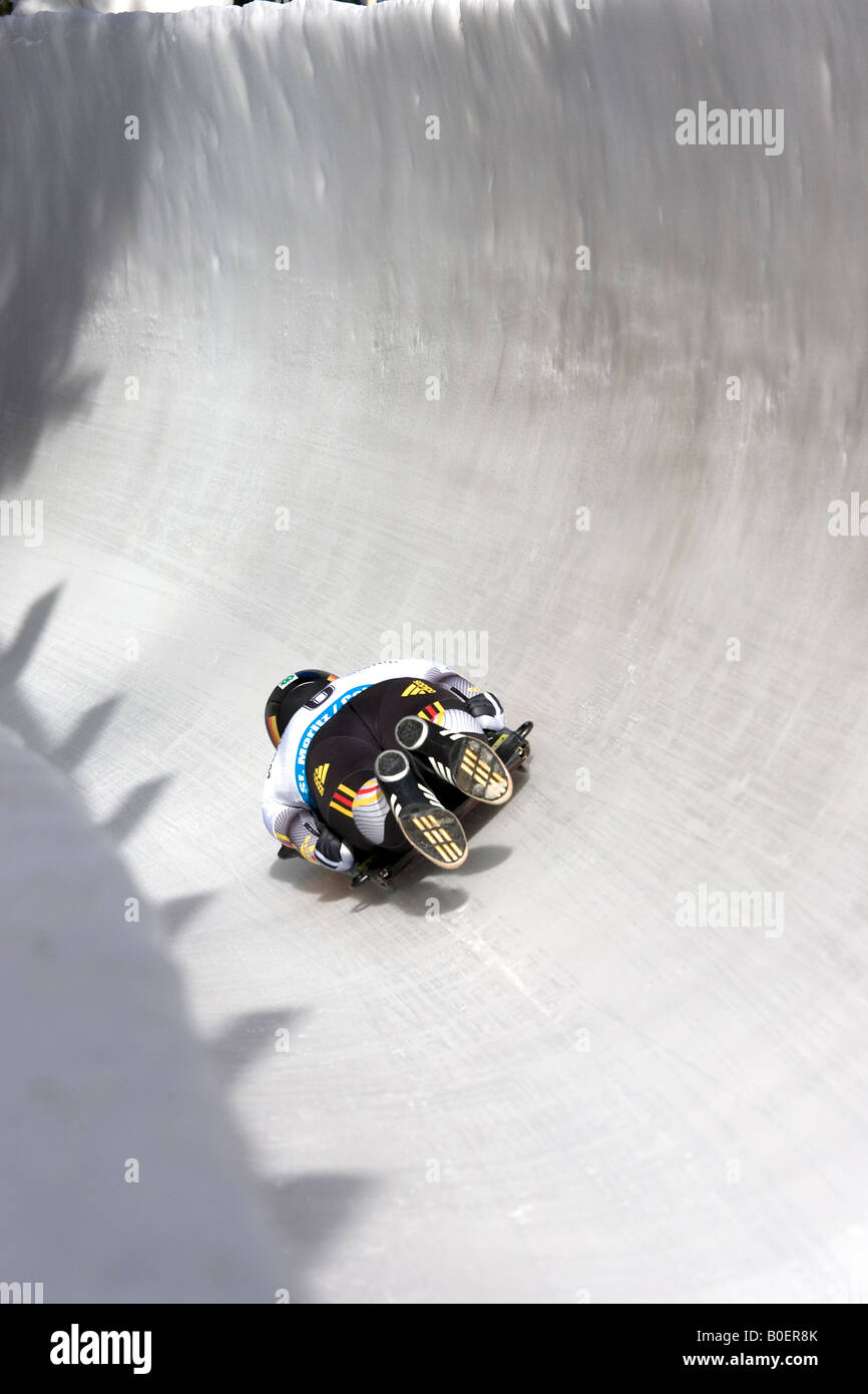 A Skeleton racer speeds down the St Moritz Olympic track Switzerland Stock Photo