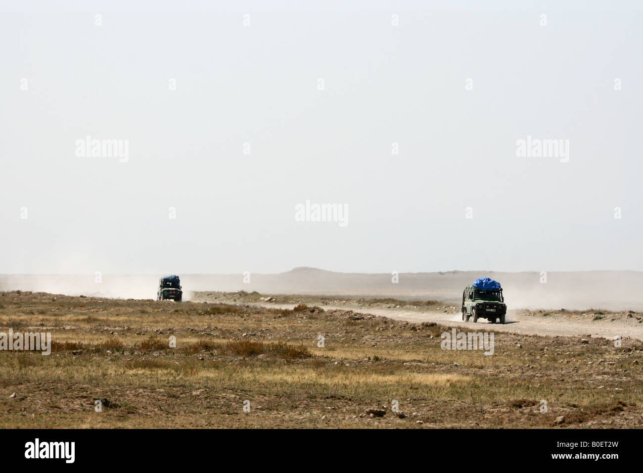 Riding across Serengeti plains in Tanzania, Africa Stock Photo