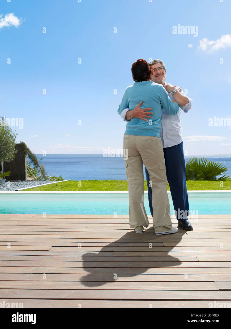 Mature man and woman dancing outside Stock Photo