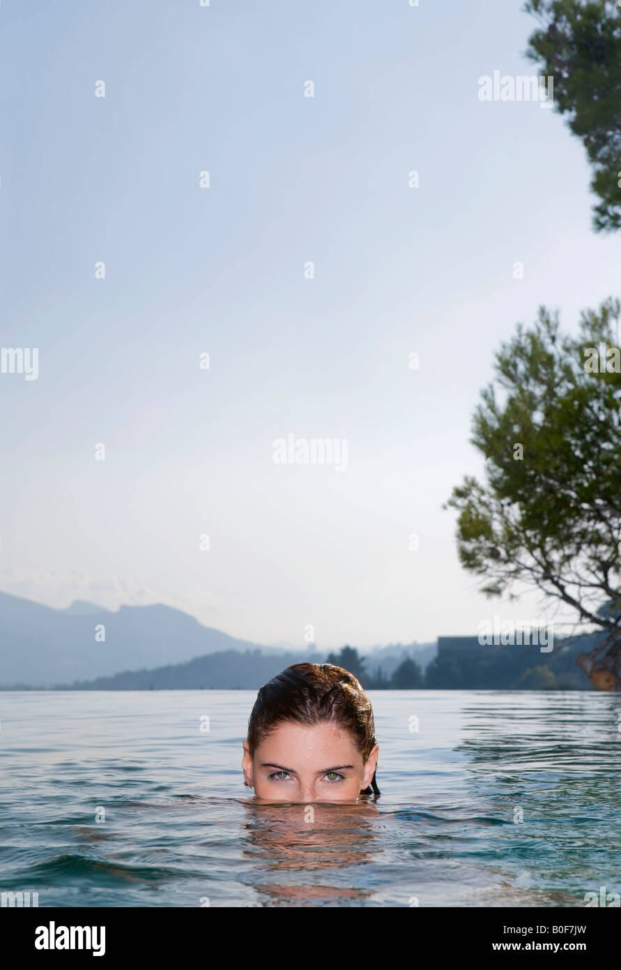 Young woman in a pool Stock Photo