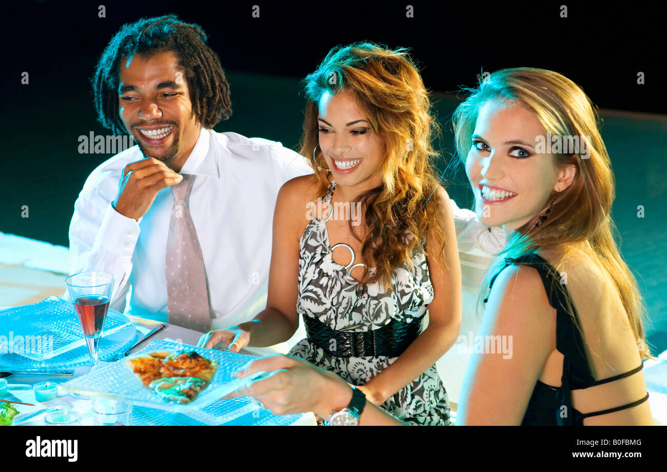 Man and women at a party Stock Photo - Alamy