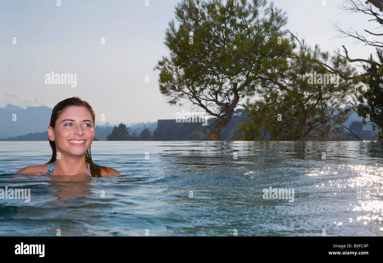 Woman on swimming pool hi-res stock photography and images - Alamy