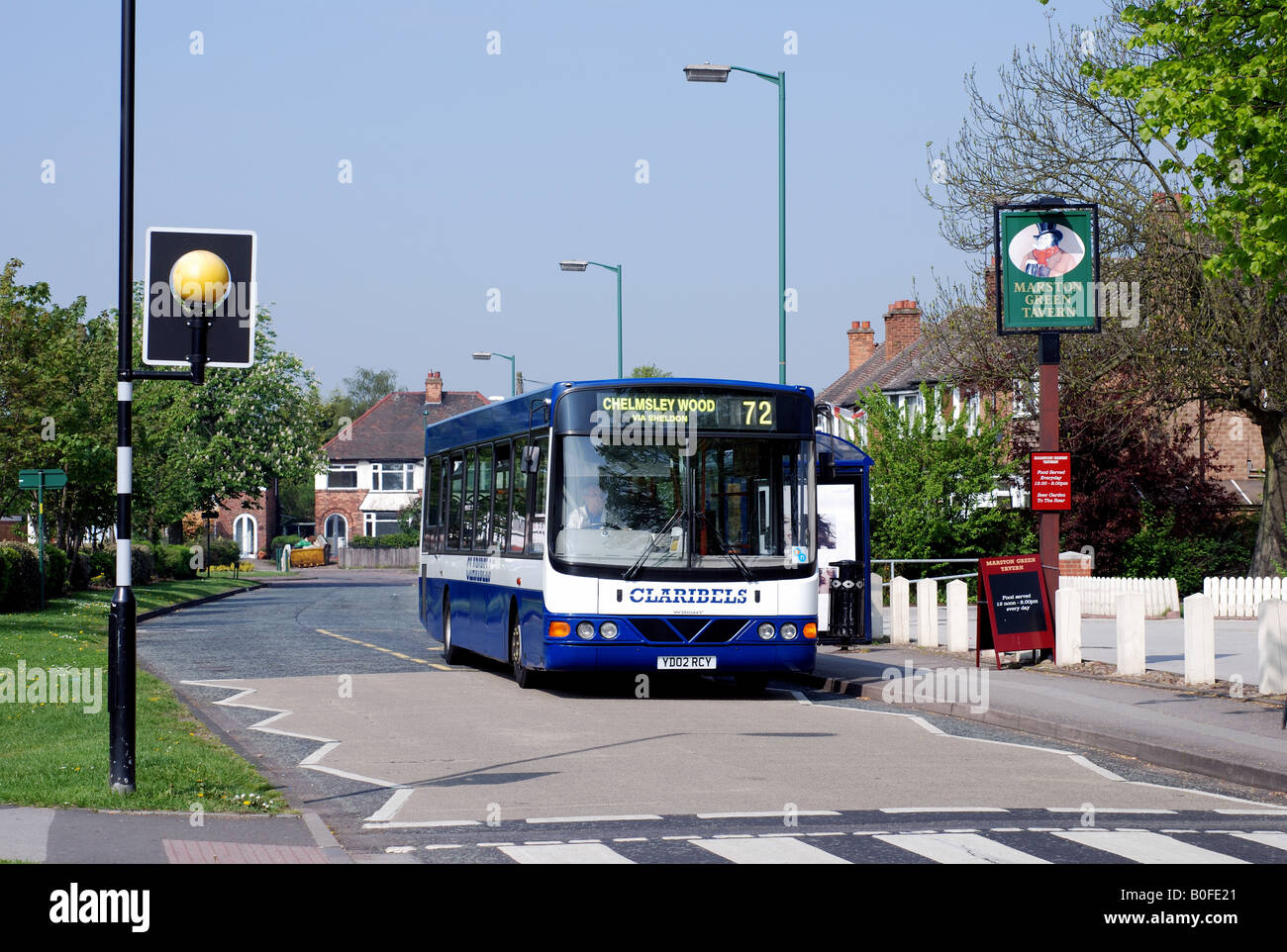 Local bus in Marston Green village centre, West Midlands, England, UK