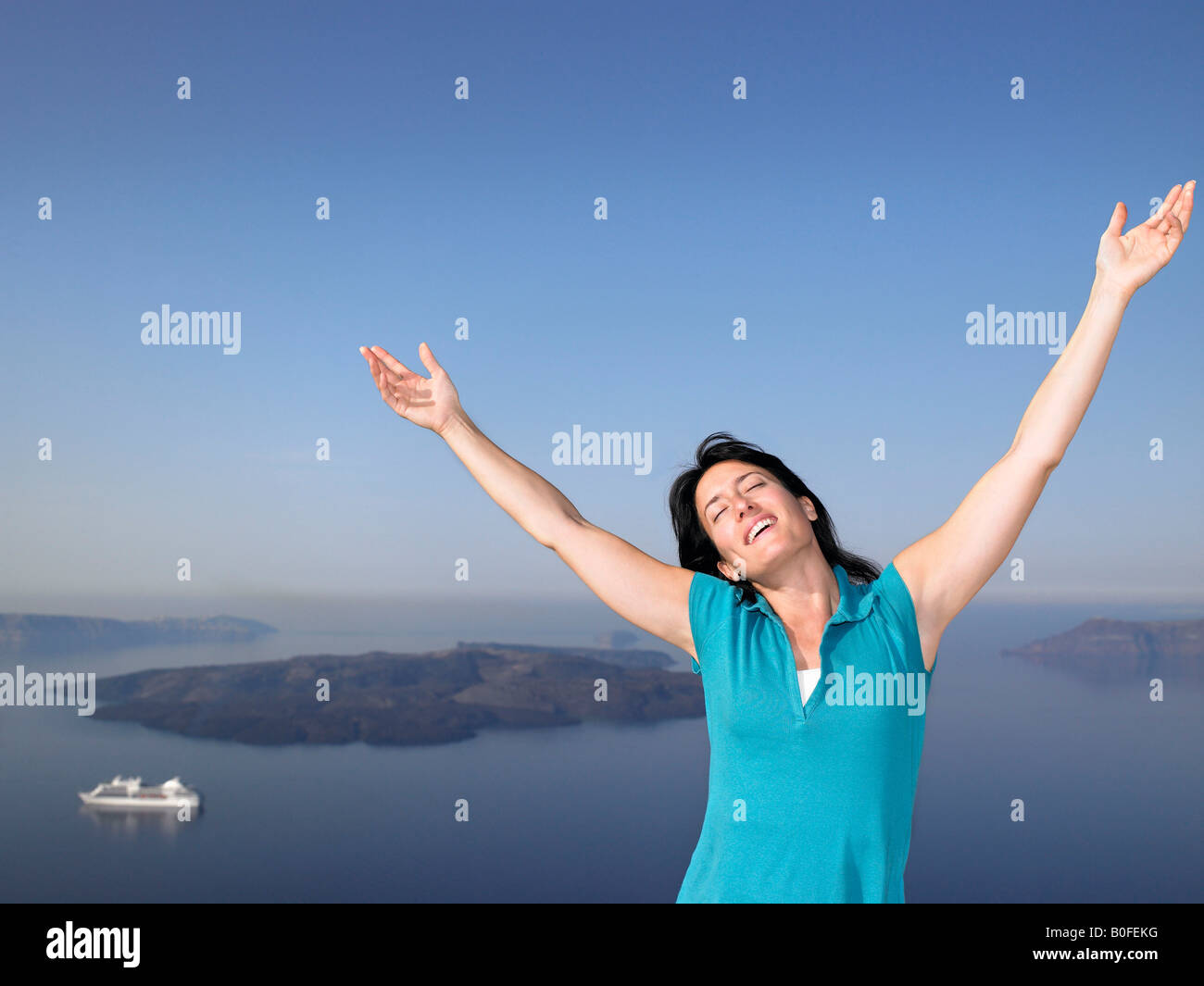 Woman arms raised ocean hi-res stock photography and images - Alamy